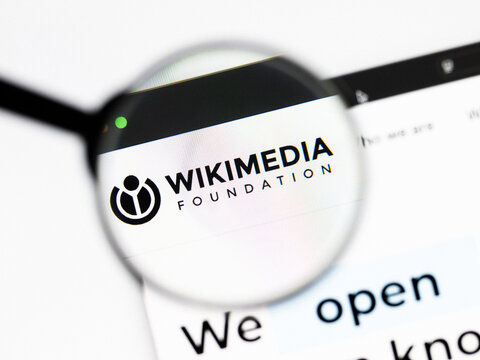 Milan, Italy 2026, 20 Apr Closeup of Wikimedia Foundation website on a laptop screen. Wikimedia Foundation logo under a magnifying glass.