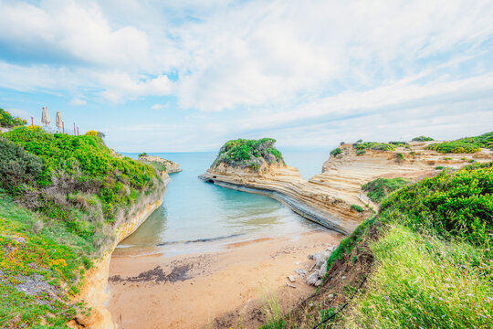 Cape Drastis, natural landscape with white rocks and turquoise waters, northern part of Corfu island, Ionian islands of Greece