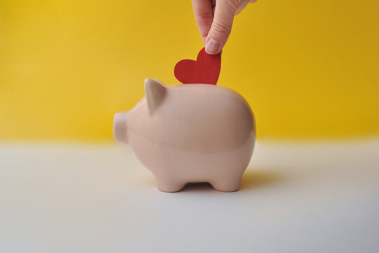 Putting Heart into Piggy Bank - Saving for Love or Charity