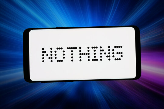Stuttgart, Germany - 06-05-2026: In this photo illustration, the logo of British company Nothing Technology Limited is displayed on a smartphone in front of abstract background on computer screen.