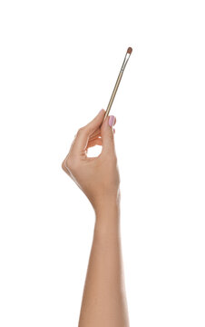 Woman with makeup brush on transparent background, closeup