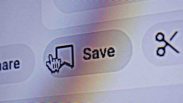 Close-up of a cursor clicking the Save button on a digital interface. Concept of user interaction, web navigation, and online content saving. High quality 4k footage