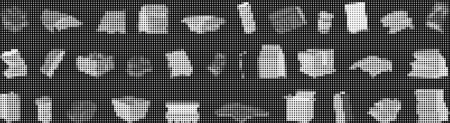Fototapeta premium A collection of various white objects are arranged on a black background.