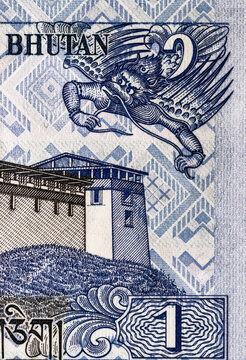 1 ngultrum banknote of Bhutan with the image of Simtokha Dzong Palace, fragment for designers. Paper money of Bhutan.
