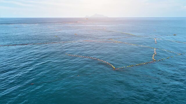 Aerial of a permanent fish nets off the coast of Taiwan.