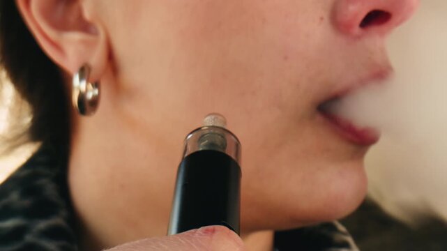 Woman smoking Vape, smoking electronic cigarette bad habit smoke breath health problem, THC CBD vape.