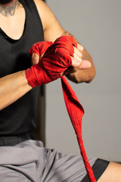 Close up of boxer wrapped fist in gym