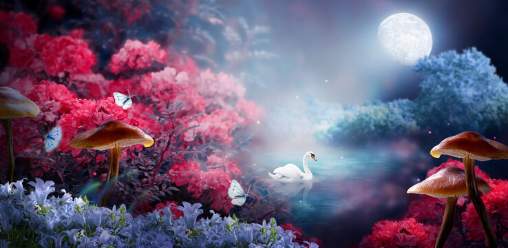 Fantasy whimsical enchanted fairy tale landscape with swan swimming in lake, whimsy fairytale pink rose flower bloom, bluebells, butterflies and mushrooms on mysterious background and moon in night.