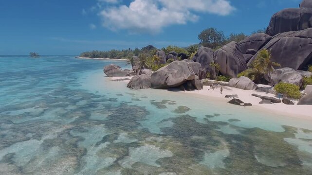 Anse Source D'Argent view on la digue island in Seychelles, aerial view in slow motion