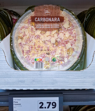 DENIA, SPAIN - January 31, 2026.Chilled Chef Select Carbonara pizza on grocery store shelf in Spain with price label displayed