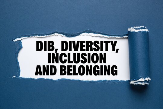DIB diversity inclusion and belonging text under torn dark blue paper