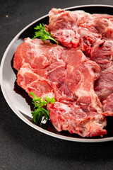Obraz premium Raw pork steak pork tenderloin, food preparation lunch or dinner tasty organic snack fresh farm product delicious gourmet food background on the table rustic food, top view copy space