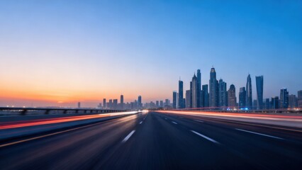 Obraz premium Highway at dusk with city skyline