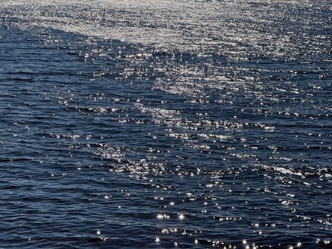 Sea blue sparkling water surface.