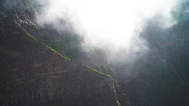 Cinematic Drone Shot of Misty Mountain Cliff covered n Clouds