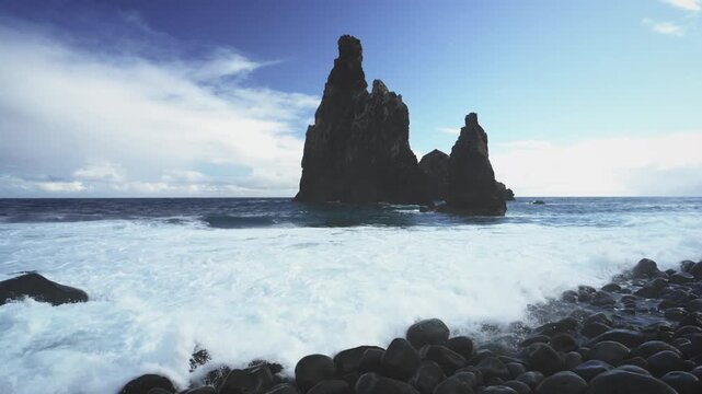 Aerial View of Volcanic Black Stone Beach and Ocean Sa Rock
