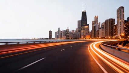 Fototapeta premium City skyline at dusk with light trails