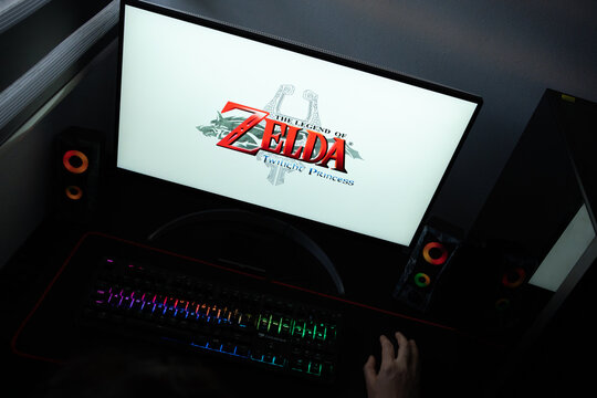 Punta Arenas, Chile &ndash; June 17, 2026: The official video game logo with the Wolf Link emblem for The Legend of Zelda: Twilight Princess displayed on a computer screen in a dark room workspace setup
