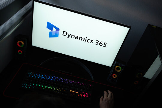 Punta Arenas, Chile &ndash; June 12, 2026: The official Microsoft Dynamics 365 business applications logo and text displayed on a computer screen in a dark room workspace setup