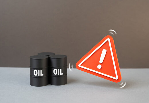 Oil and attention symbol. Oil shortage, depletion of reserves. Supply problems. High global energy prices.