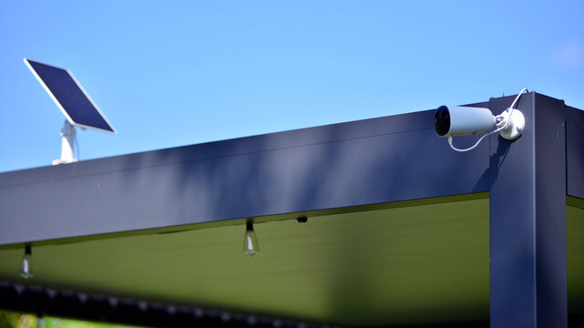 Security camera installed in the garden of a house for the surveillance to outdoor the house.