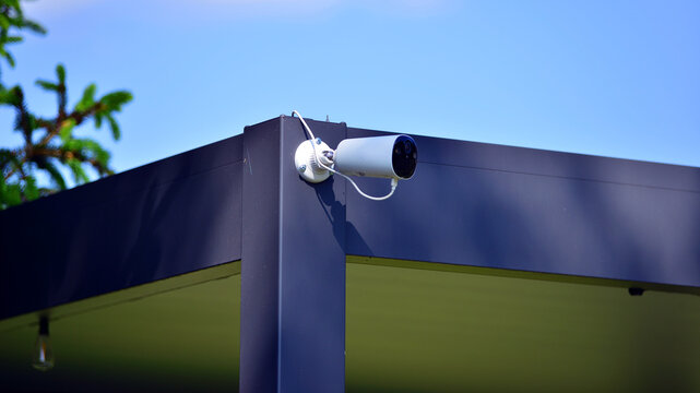 Security camera installed in the garden of a house for the surveillance to outdoor the house.