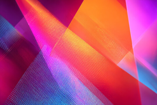 Vivid abstract background featuring dynamic geometric shapes and vibrant gradients in pink, orange, and purple hues. Modern digital art concept for creative design projects