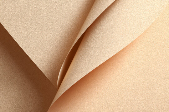 Minimalist abstract background featuring layered beige paper sheets with soft shadows and textured surface. Modern design concept ideal for branding, presentations, and creative projects