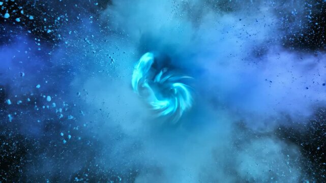 Mesmerizing slow-motion blue and cyan powder explosion on black background, creating a stunning abstract visual.