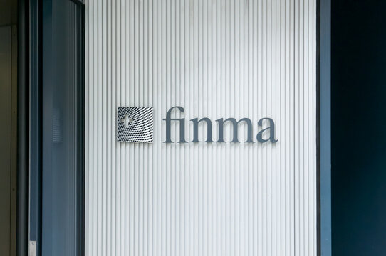 FINMA Swiss Financial Market Supervisory Authority sign on building entrance in Bern