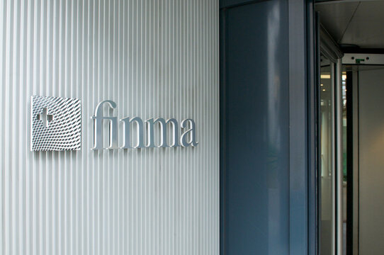 FINMA Swiss Financial Market Supervisory Authority sign on building entrance in Bern