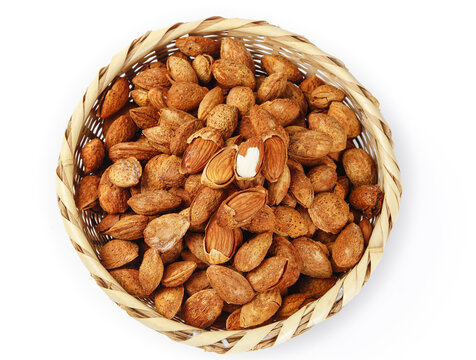 Raw Almonds in Shells in Wicker Basket - Healthy Natural Nuts for Snacking
