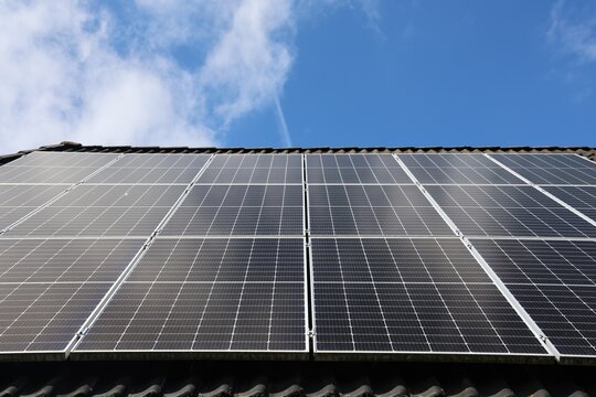 Rooftop solar panels generating clean renewable energy