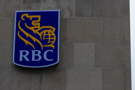 MONTREAL, CANADA, 23 December 2025 : RBC logo on building wall, corporate branding, financial institution signage
