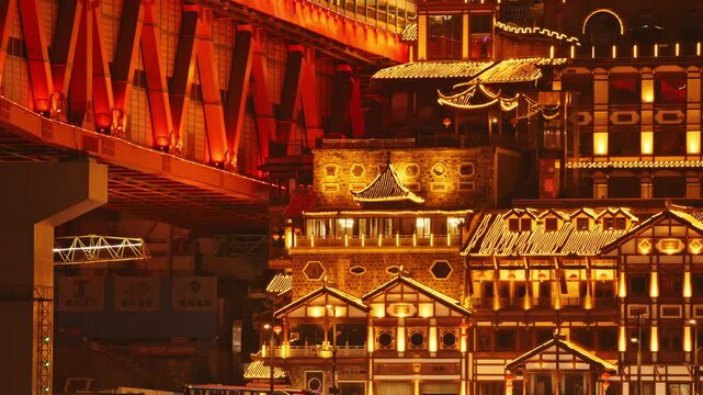 Chongqing cyberpunk city skyline with river and hongyadong night time