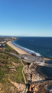 O'Sullivan Beach and Christies Beach, Adelaide, South Australia &ndash; 4K vertical aerial drone footage of sandy coastline, coastal suburbs, waterfront house, beaches, cliffs, marina, boat ramp