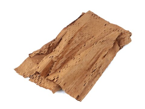 A sheet of brown kraft paper with a pre-cut honeycomb structure used as an eco-friendly and biodegradable alternative to plastic bubble wrap for packaging fragile items