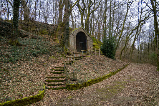 Mithras grotto entrance in woodland hillside, Freisen Saarland