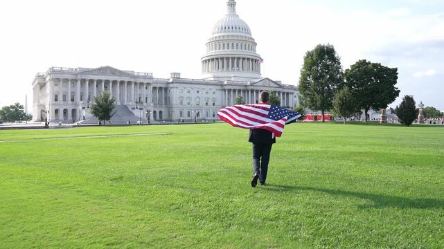 Man with American flag. Politician on independence day. Successful career in USA. Leadership and success. Successful political leader. Businessman at US Capitol. Businessman elected official