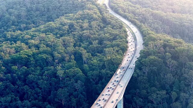 Purse bridge on Motorway One M1 in Australia aerial view of heavy holiday traffic jam.