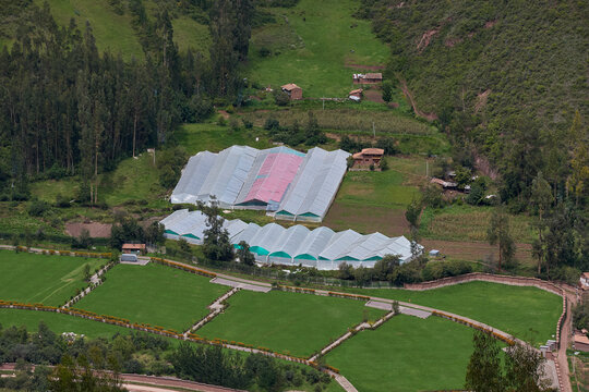 Cultivating the future from the roof of the world &mdash; a cluster of gleaming polycarbonate greenhouses nestles with quiet purpose into the lush, terraced valley floor of Chic&oacute;n, Urubamba