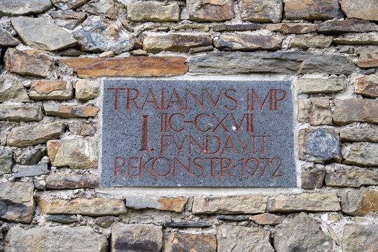 Trajan inscription plaque set in stone wall, Limes reconstruction 1972