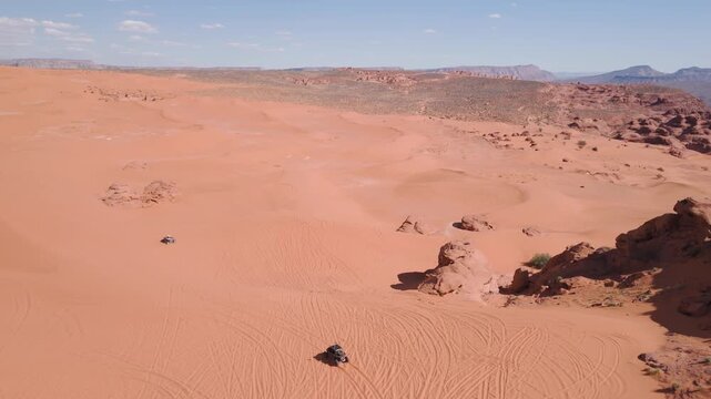 Aerial Drone View of UTVs Speeding Along Open Desert Trails in Utah