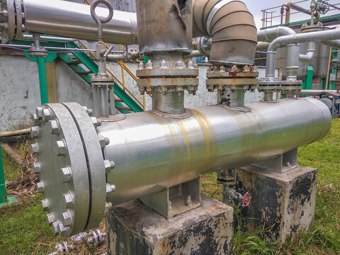 Industrial heat exchanger pipe system with steel flanges at chemical factory
