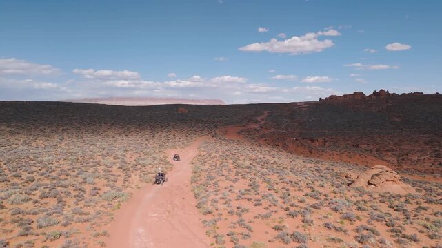 Aerial Drone View of UTVs Speeding Along Open Desert Trails in Utah