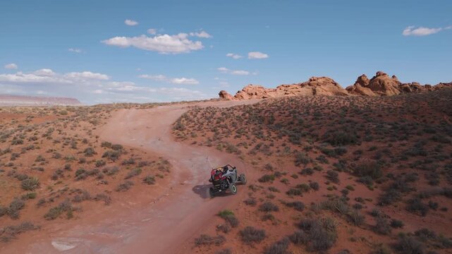 Aerial Drone View of UTVs Speeding Along Open Desert Trails in Utah
