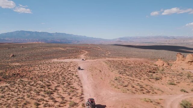 Aerial Drone View of UTVs Speeding Along Open Desert Trails in Utah