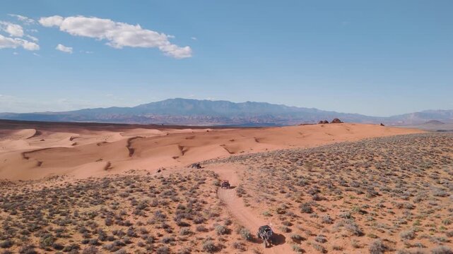Aerial Drone View of UTVs Speeding Along Open Desert Trails in Utah