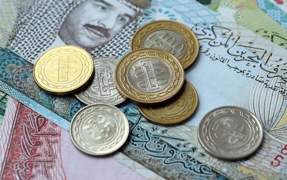 Bahraini dinar money bills and coins on table. Bahrain cash of BHD currency close up