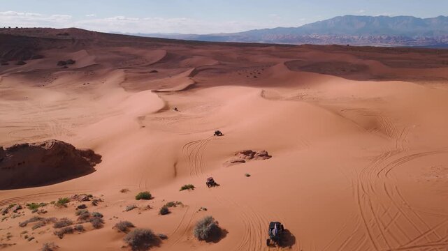 Aerial Drone View of UTVs Speeding Along Open Desert Trails in Utah